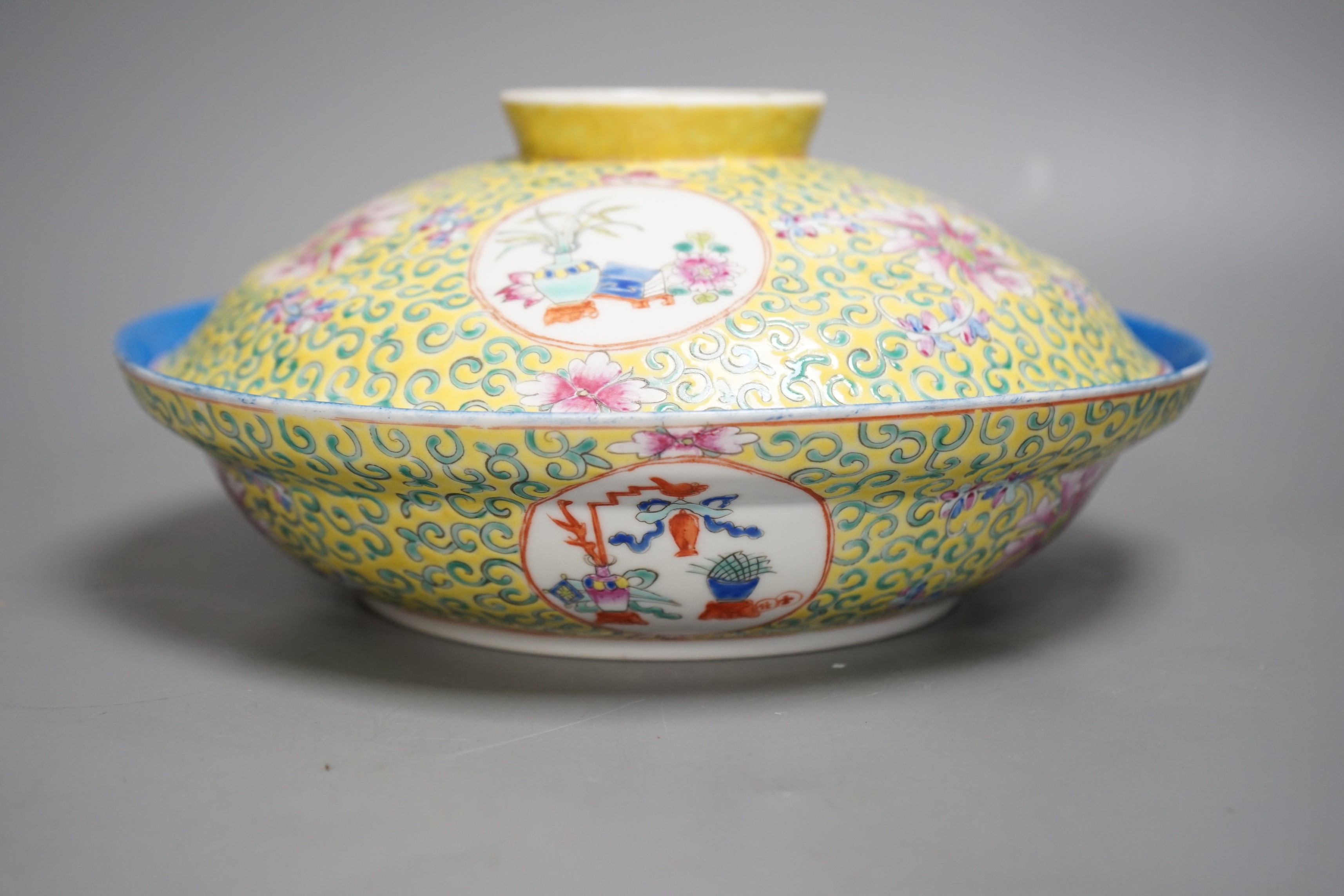 A large Chinese famille rose yellow ground bowl and cover, Republic period, 25cm diameter